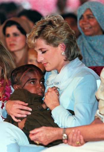 Diana comforting a child